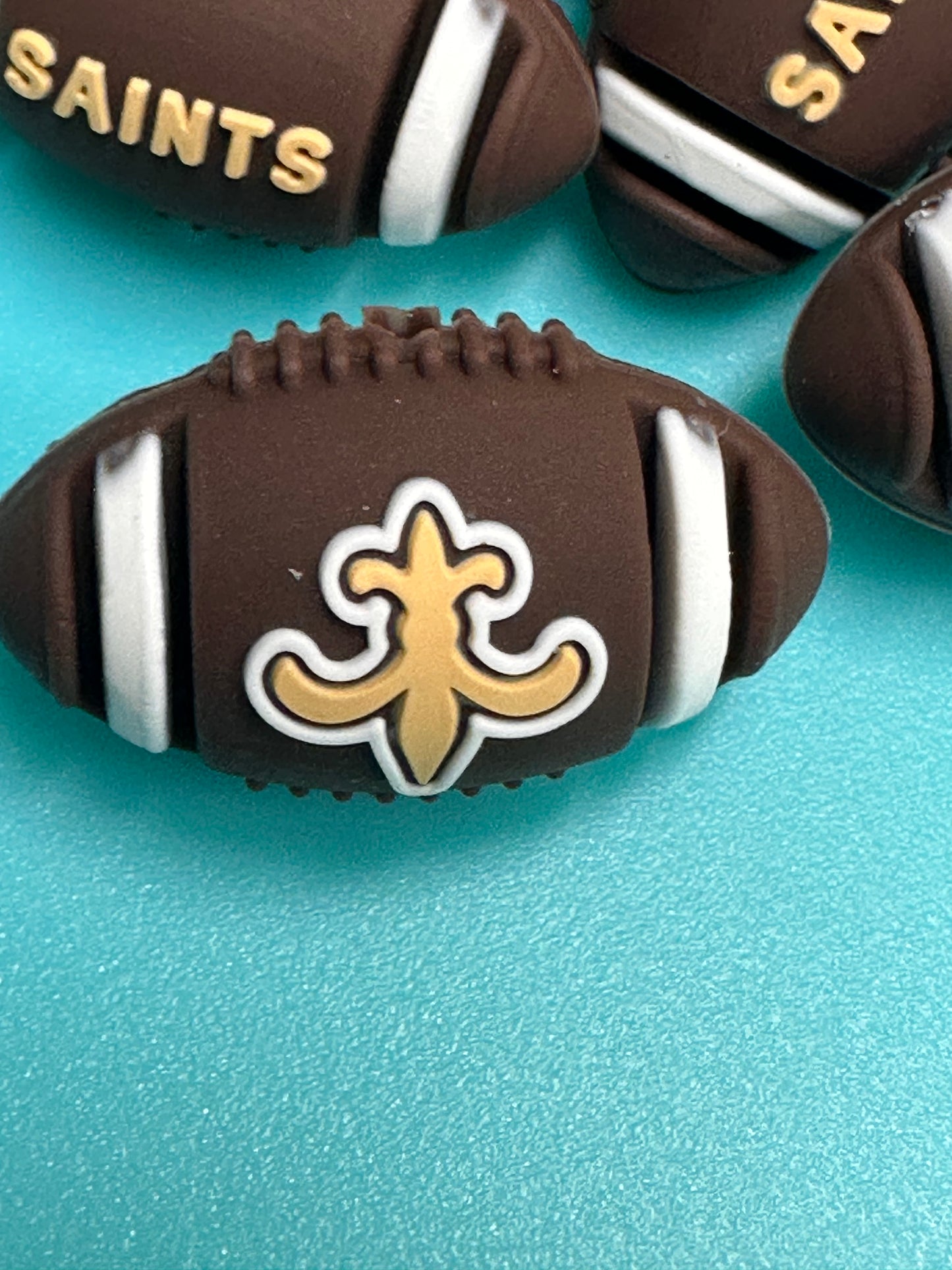 3D football shaped New Orleans Saints focal bead