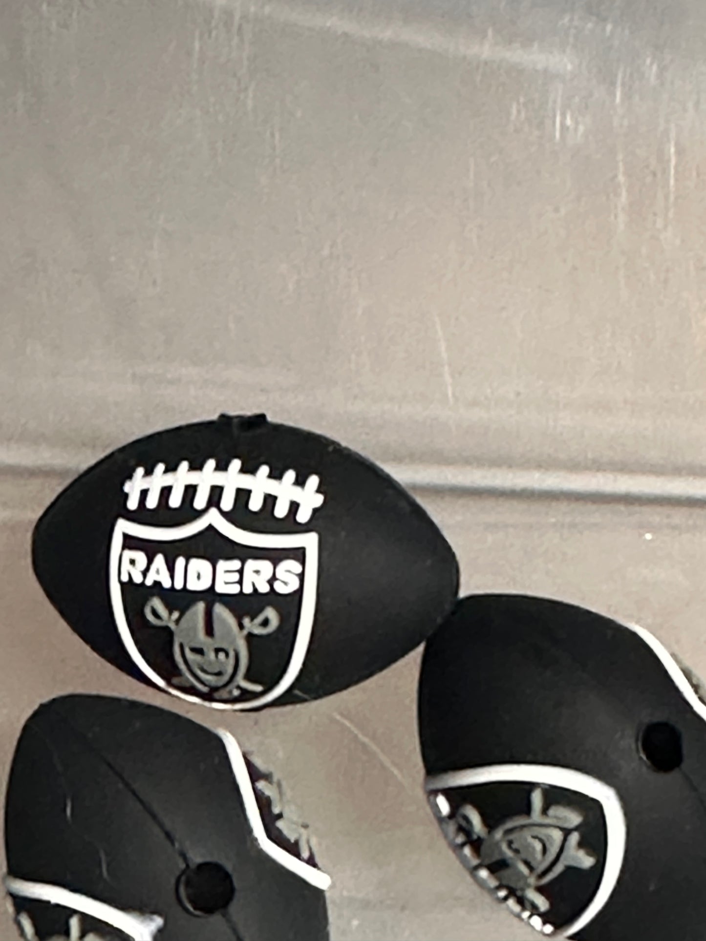 3D Las Vegas Raiders focal bead / football shaped silicone bead