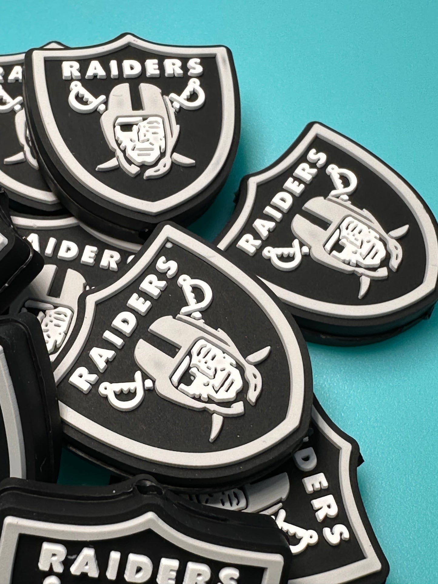 Las Vegas Raiders focal bead / football/ shield shaped