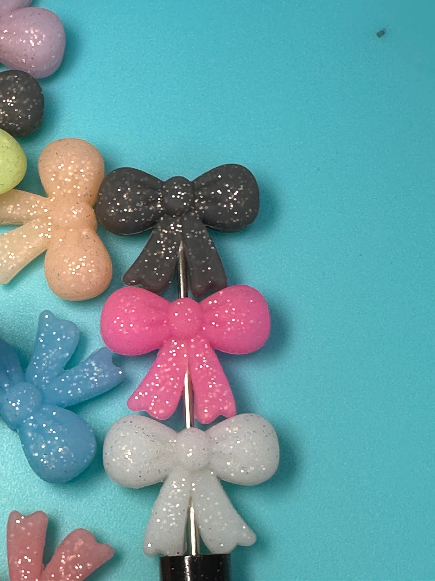3D silicone focal bead/glittery bow
