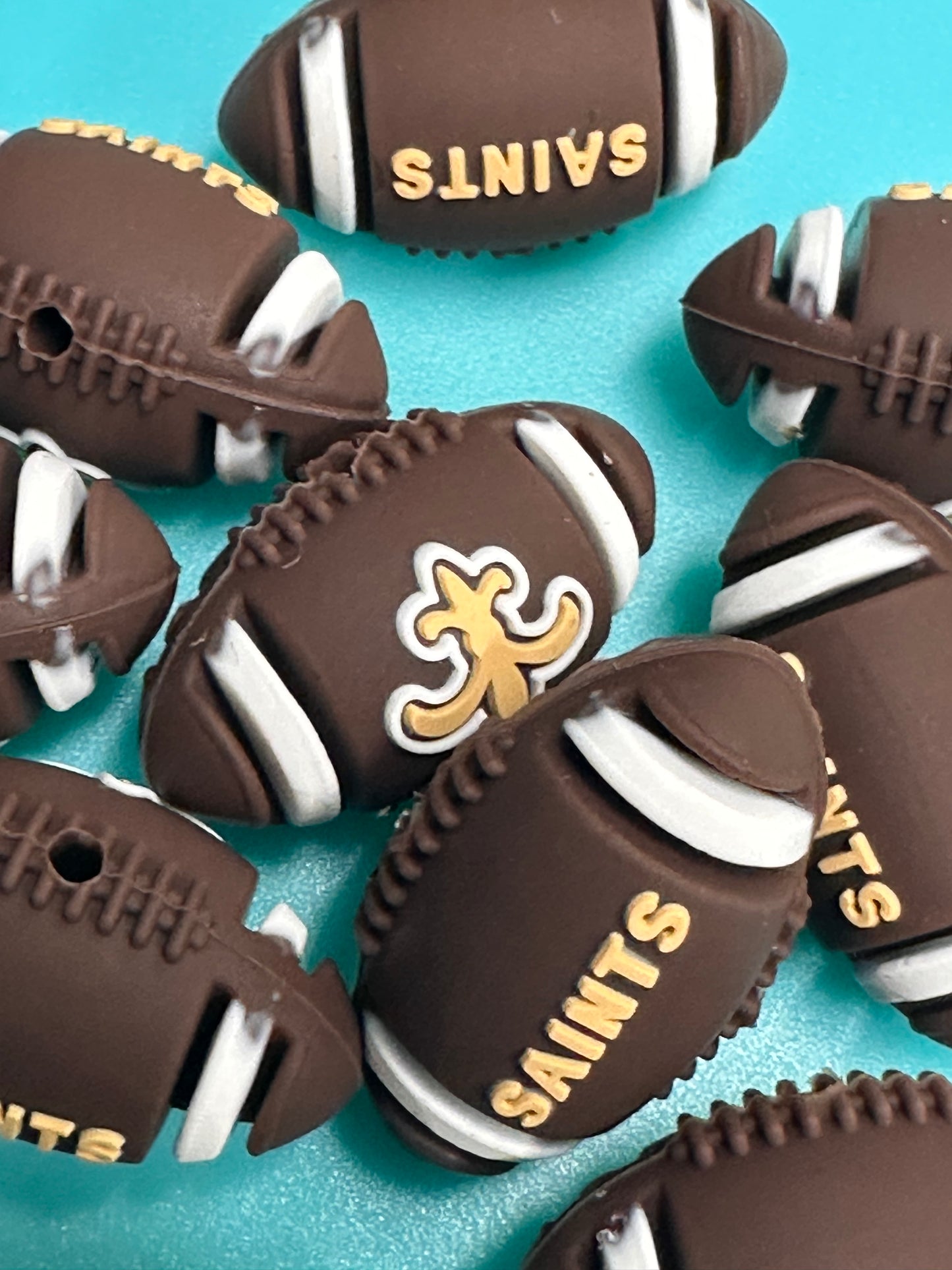 3D football shaped New Orleans Saints focal bead