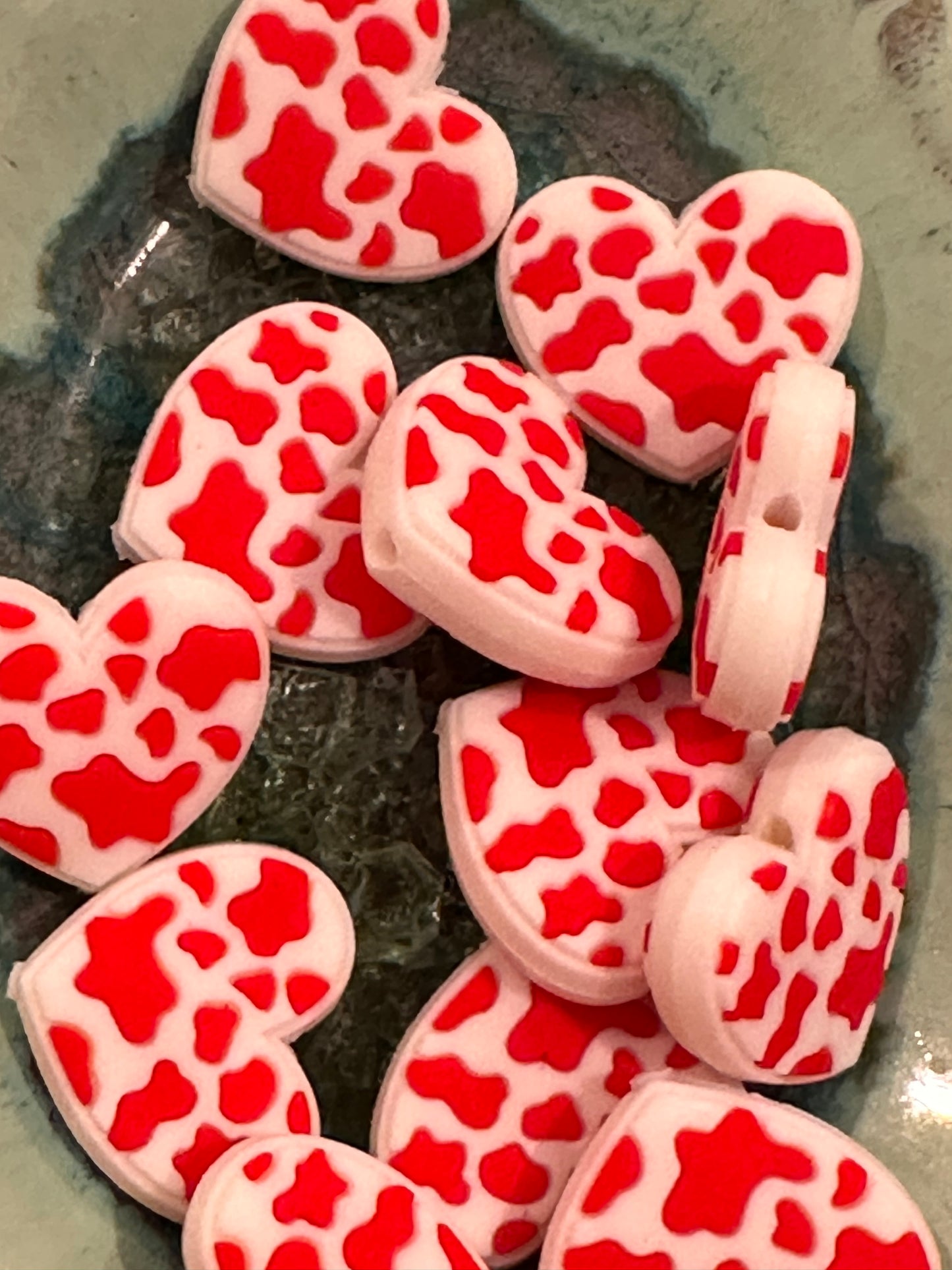 Heart shaped red cow spots focal bead