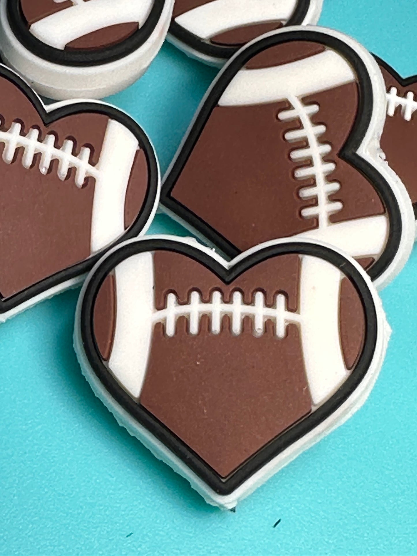 Football heart shaped silicone focal bead/ Football