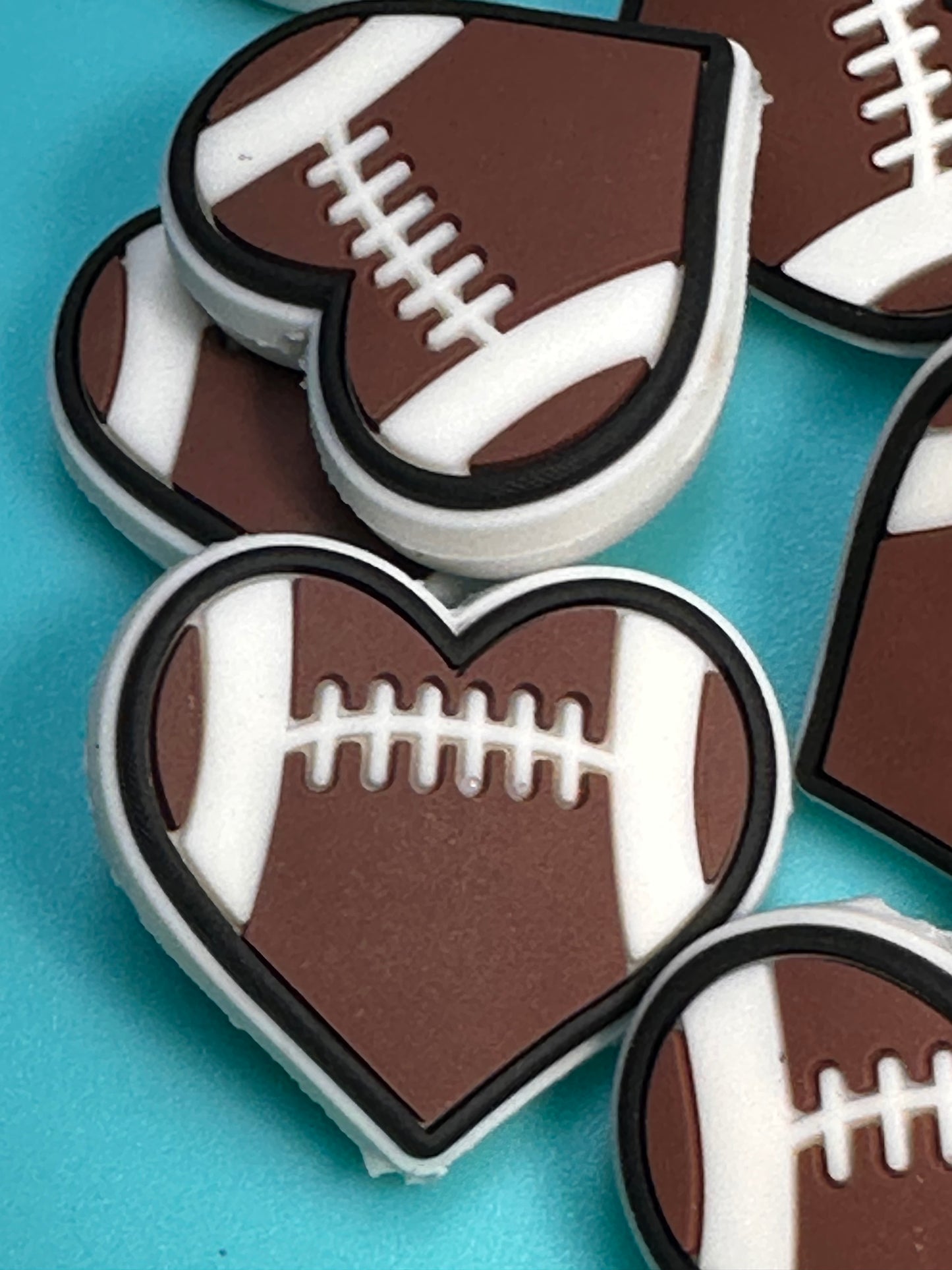 Football heart shaped silicone focal bead/ Football