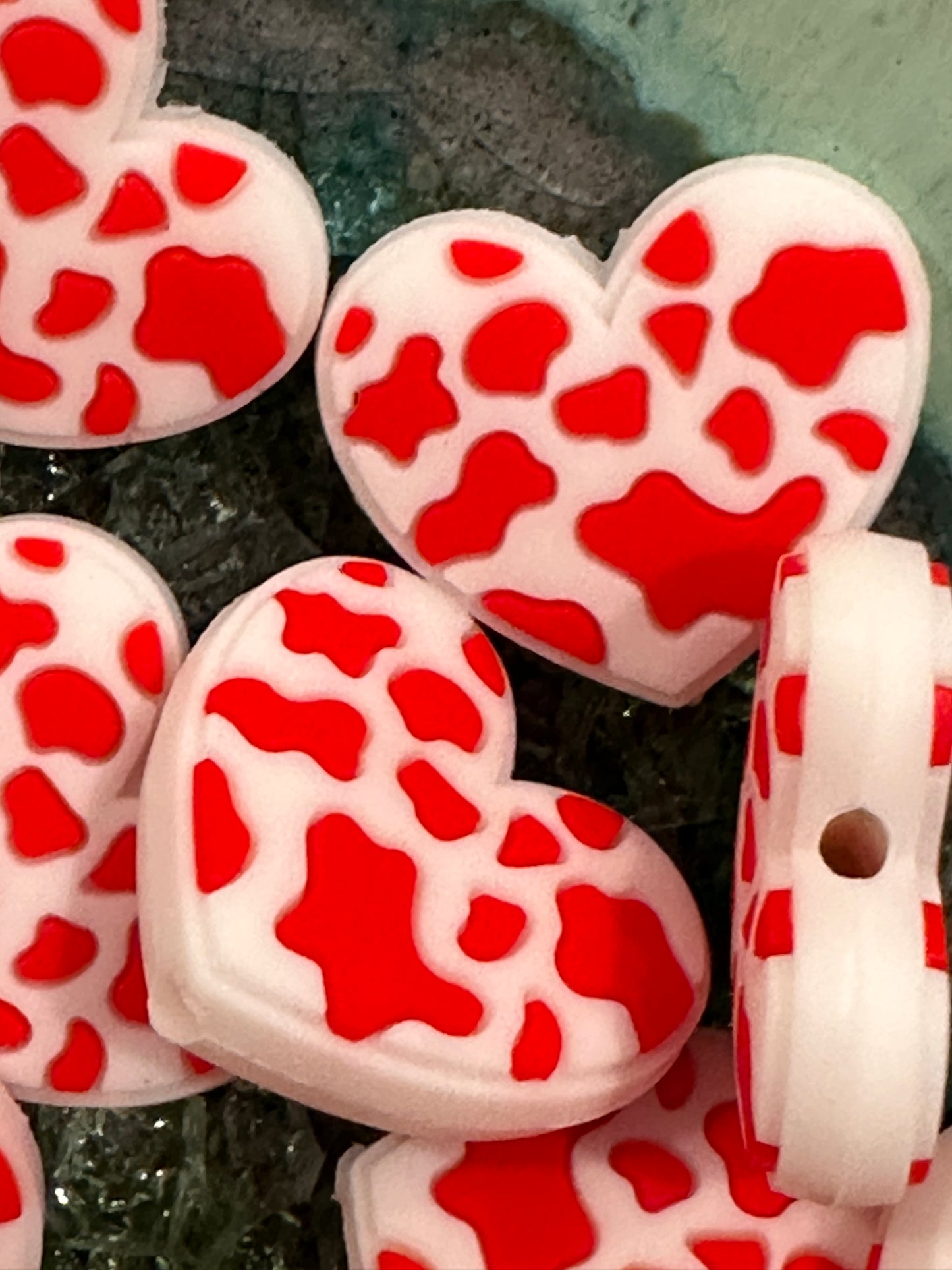 Heart shaped red cow spots focal bead