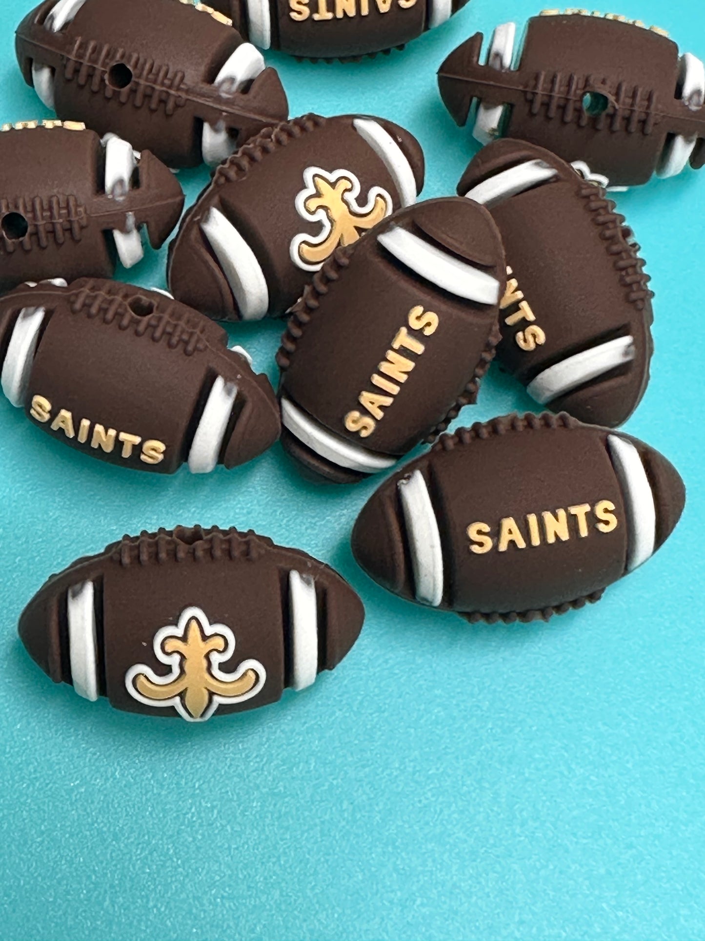 3D football shaped New Orleans Saints focal bead