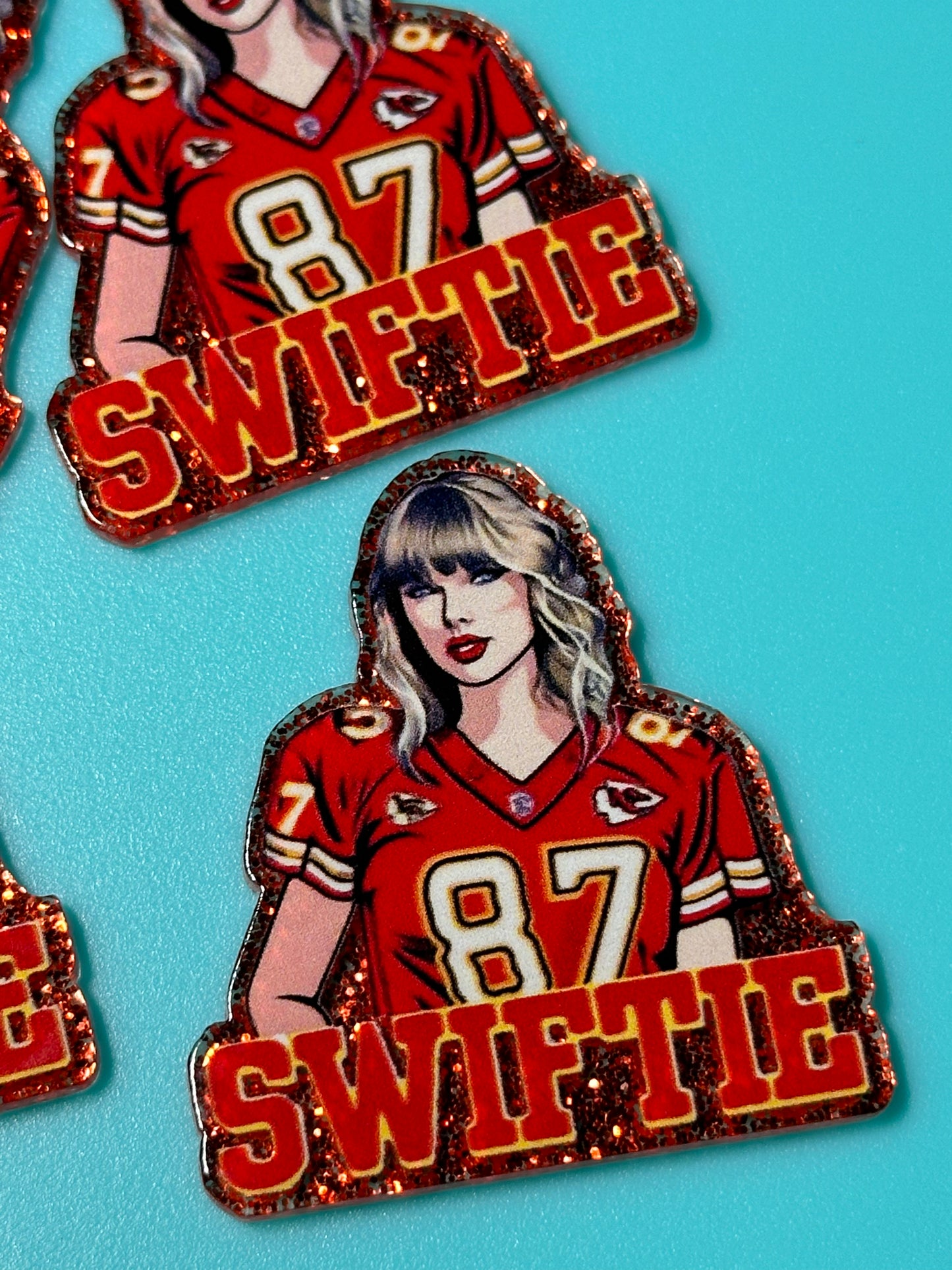 Three (3) Taylor Swift football jersey acrylic pieces/ cute print/ badge reel/