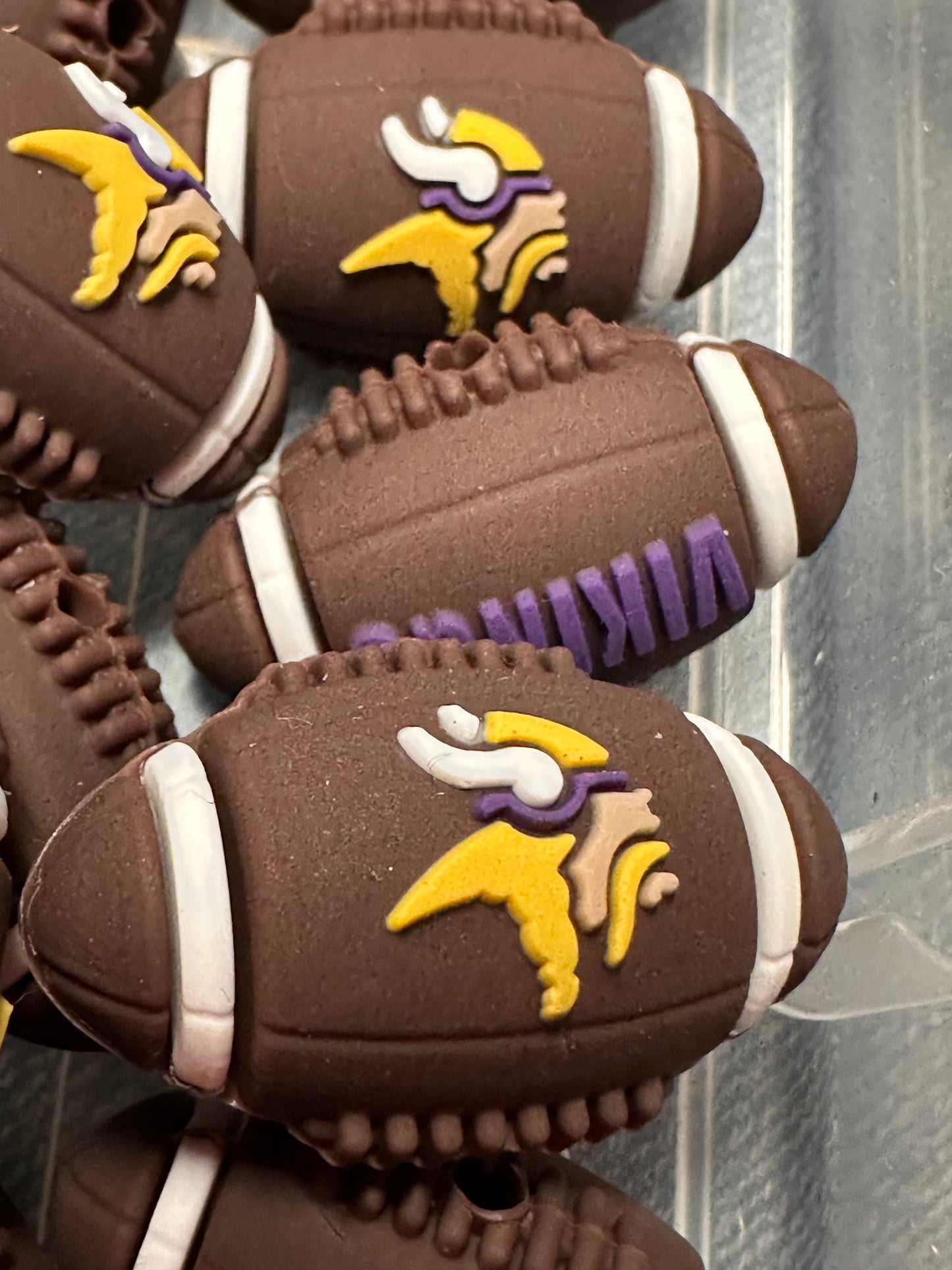 3D Minnesota Vikings focal bead design / brown football shaped