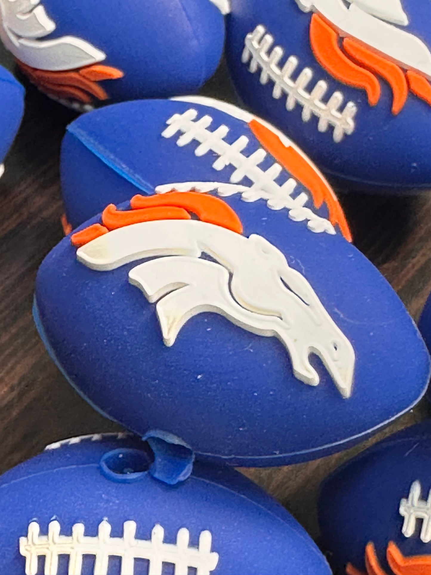 3D football shaped Denver Broncos focal bead blue bead with horse