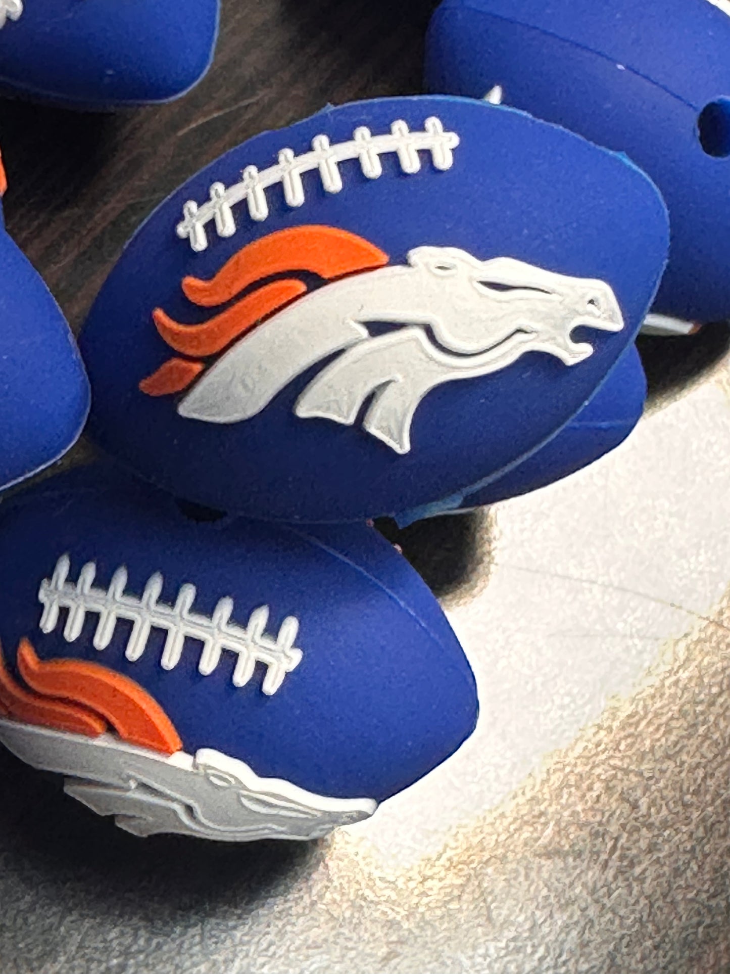 3D football shaped Denver Broncos focal bead blue bead with horse