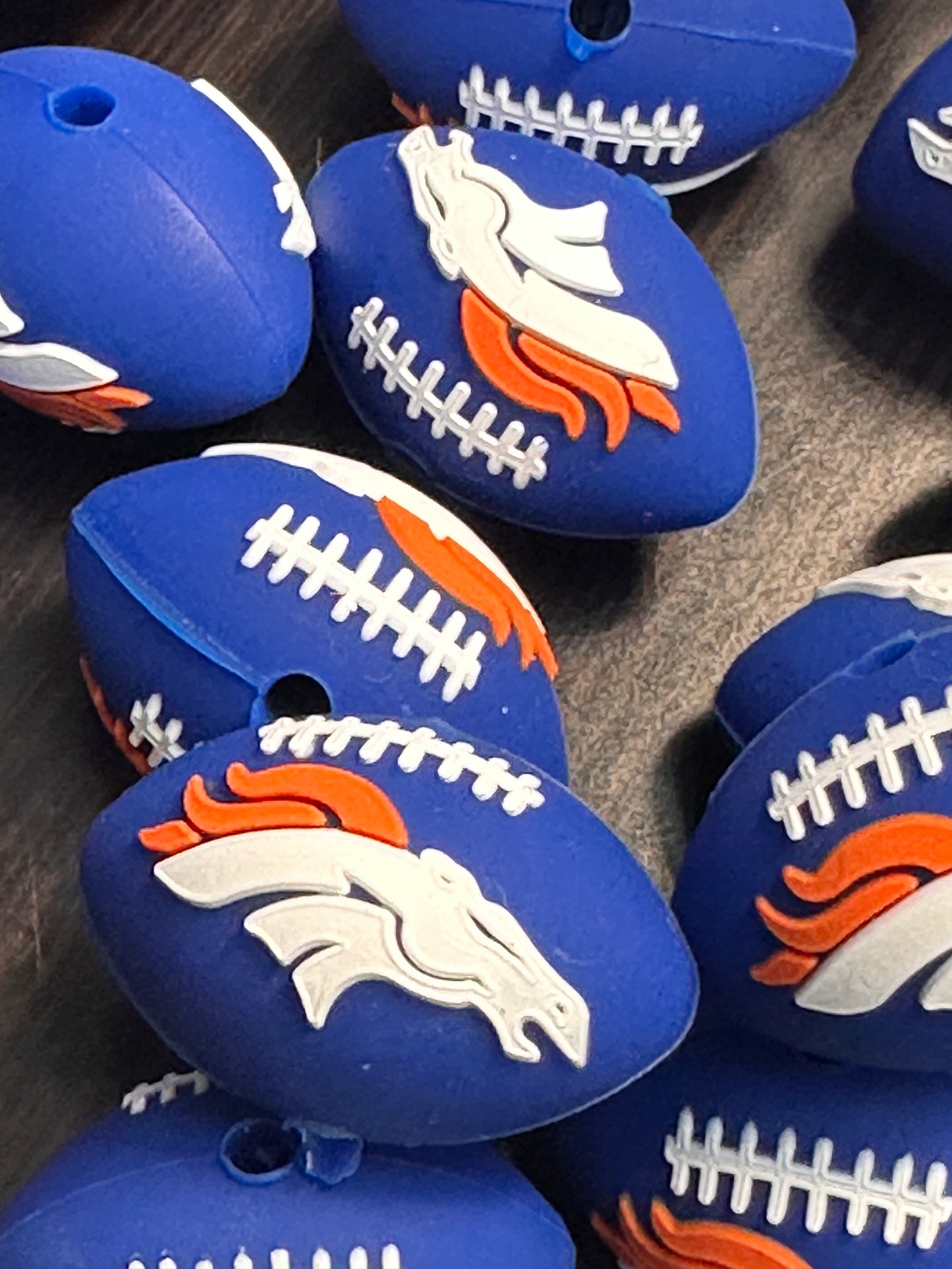 3D football shaped Denver Broncos focal bead blue bead with horse