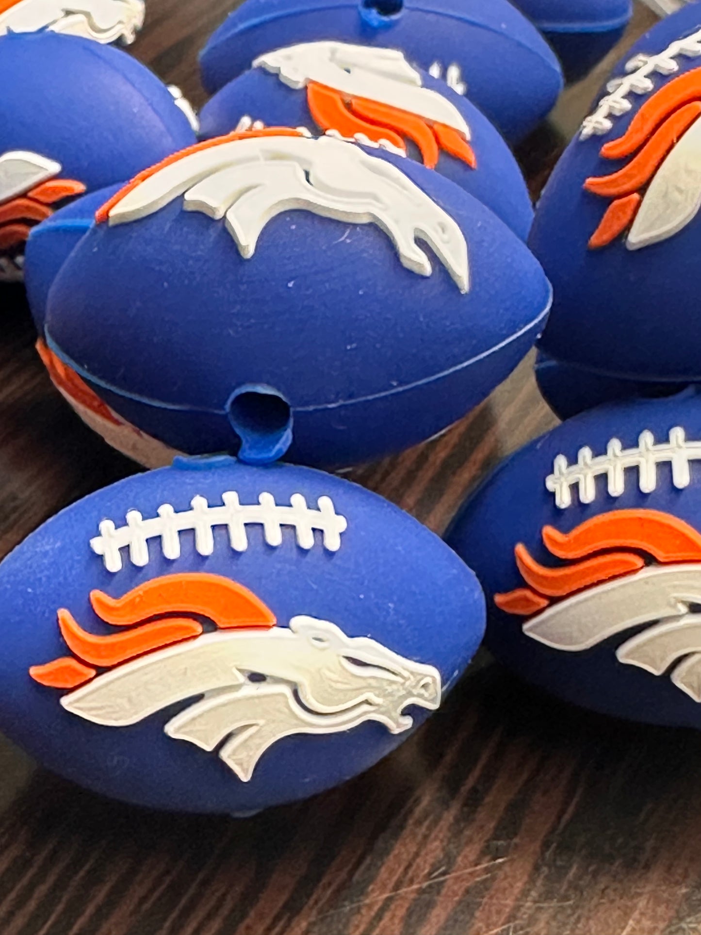 3D football shaped Denver Broncos focal bead blue bead with horse