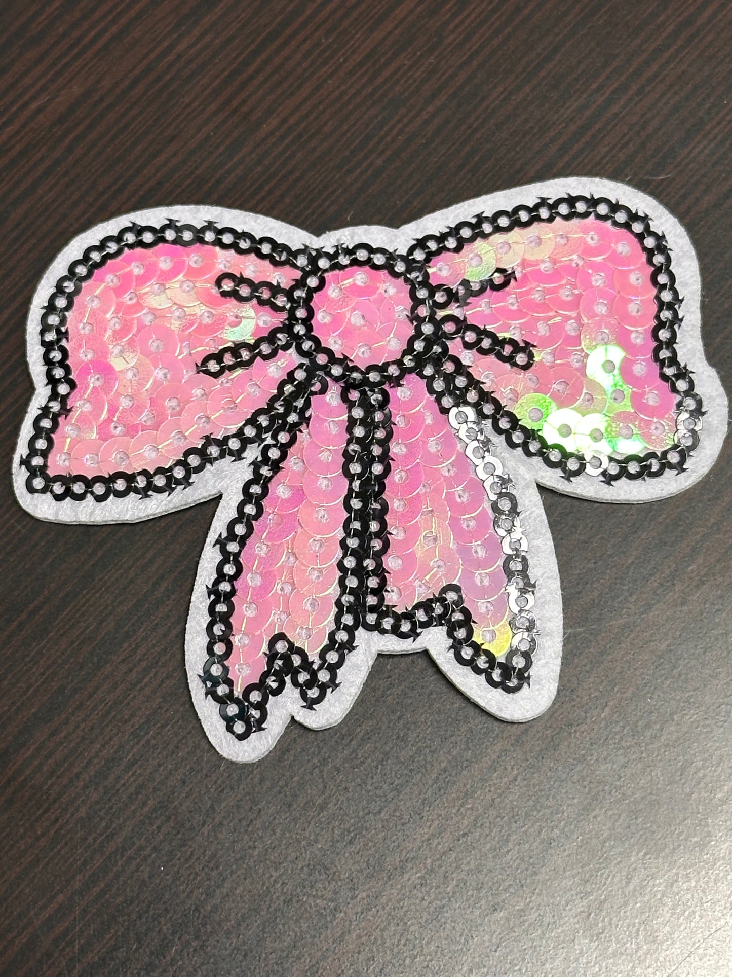 PINK BOW/IRON ON PATCH/ SIZE APPROXIMATELY 2.5 x 3.5/ SEQUIN MATERIAL/FABRIC PATCHES