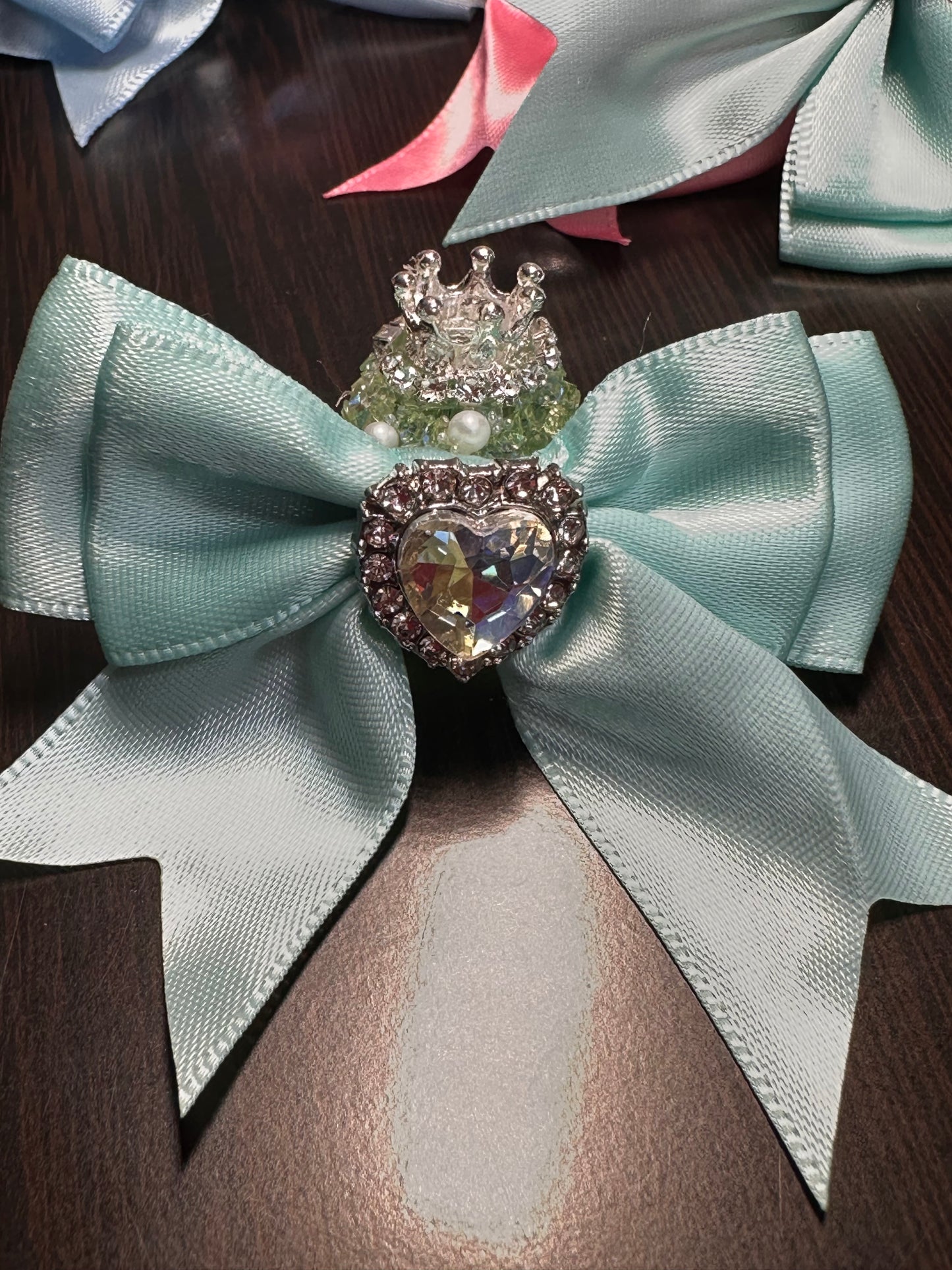 Large fancy rhinestones crown beads with satin bow