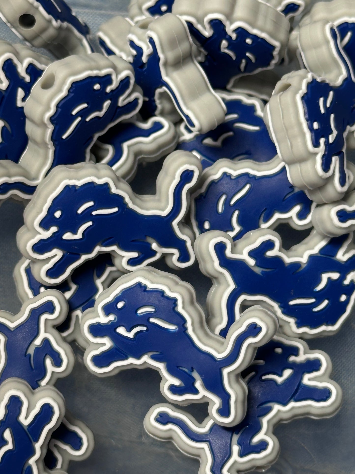 Detroit Lions focal bead/ football/ silicone bead for DIY /Lion blue -grey outline