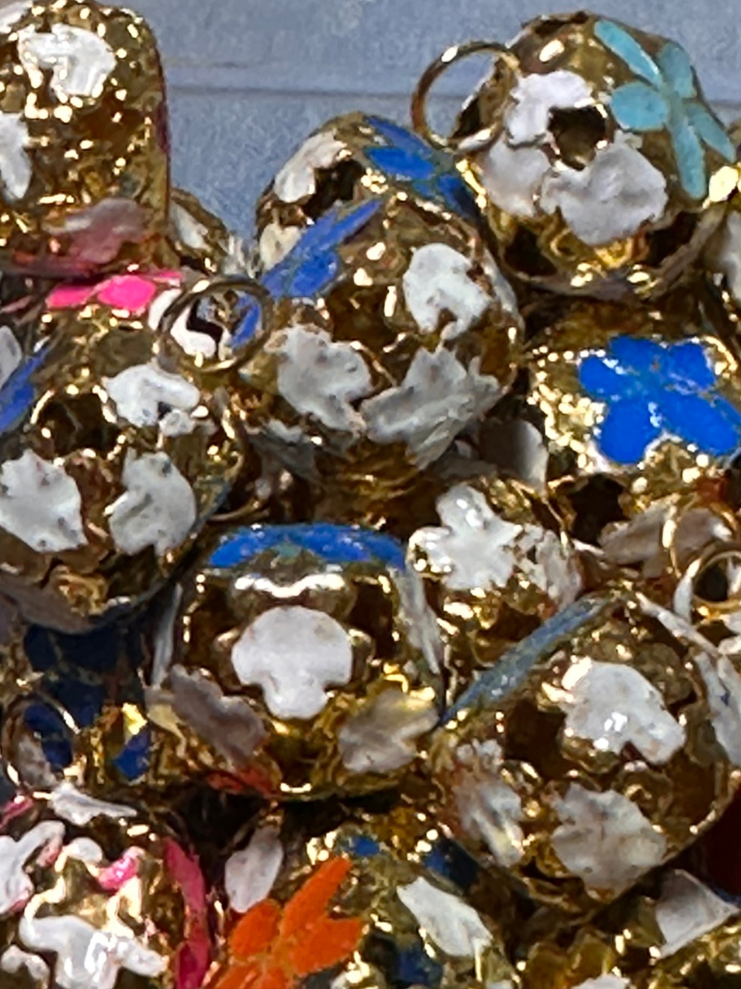 Jingle bell metal pendants/ hand painted flowers on them/ 16mm approx.