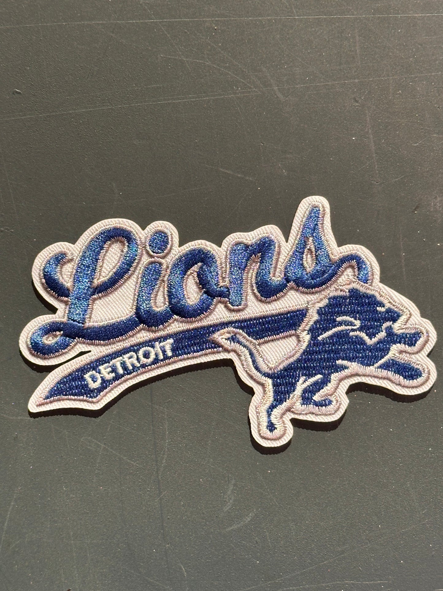 DETROIT LIONS EMBROIDERED IRON ON PATCH/ SIZE APPROX 4" x 2"/ QUALITY MATERIAL/FABRIC PATCHES/FOOTBALL TEAM