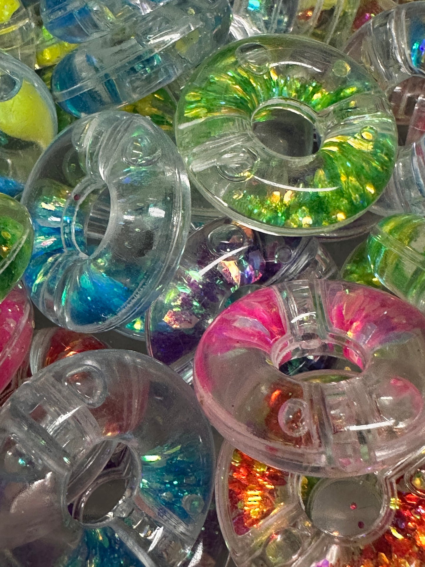 Donut shaped glitter liquid beads/ shaker beads/ snow globe beads/ jewelry Bead/ beadable pen beads/ keychain bead/ DIY/ Three (3) beads included/ 20+mm
