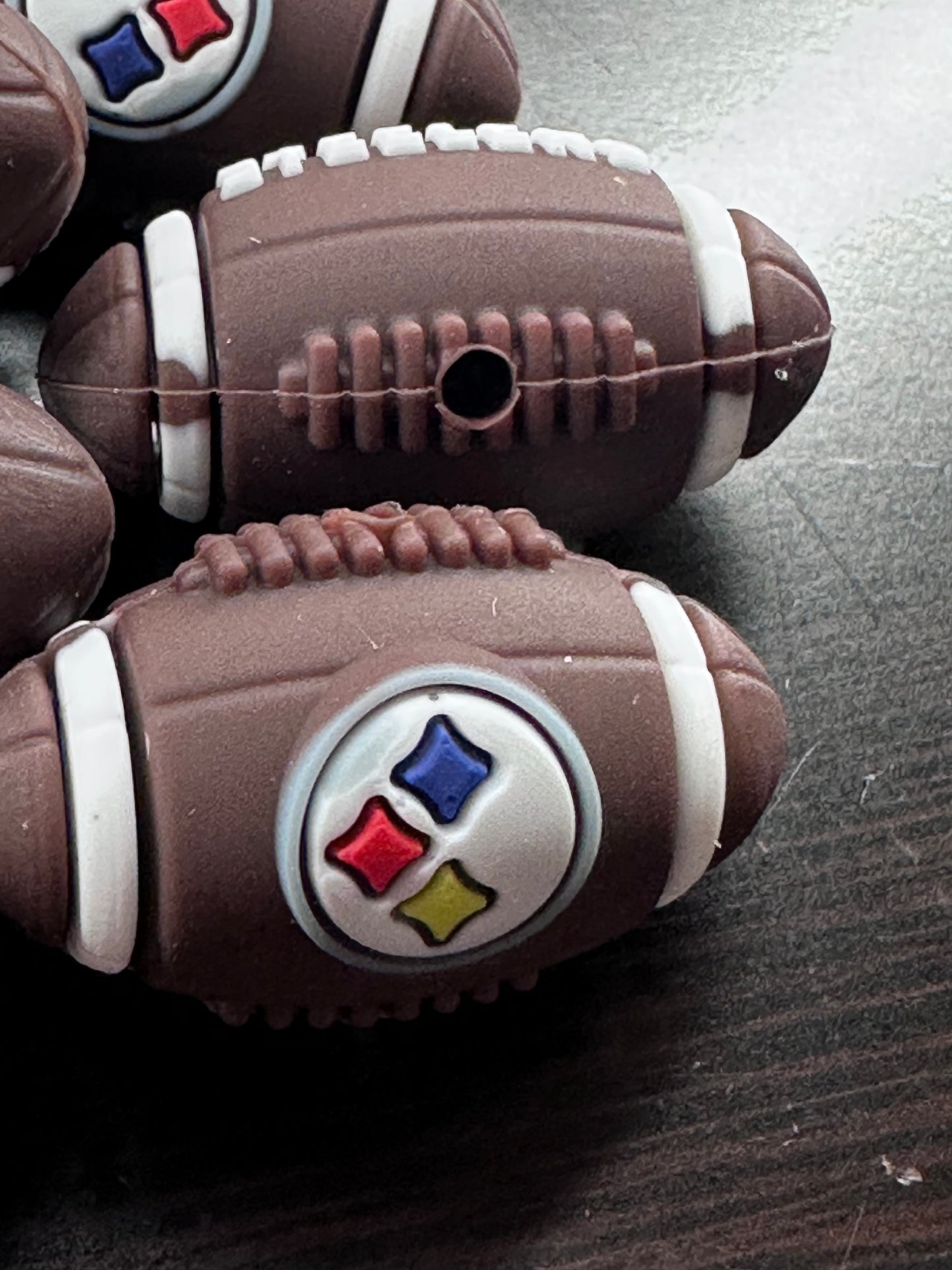 3D Pittsburg Steelers focal bead / brown silicone football