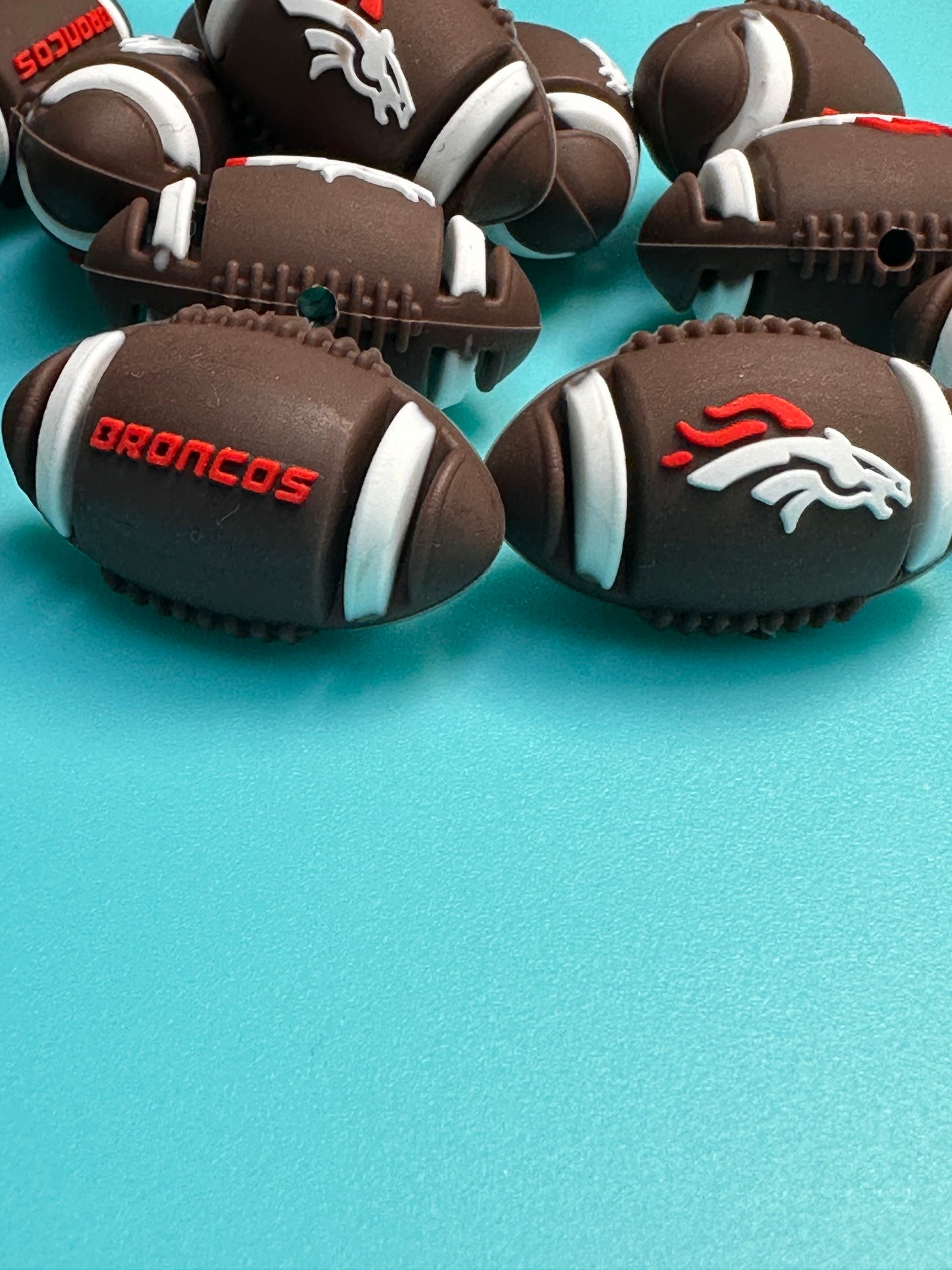 3D football shaped Denver Broncos focal bead